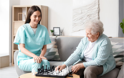 Nurse playing with elderly people