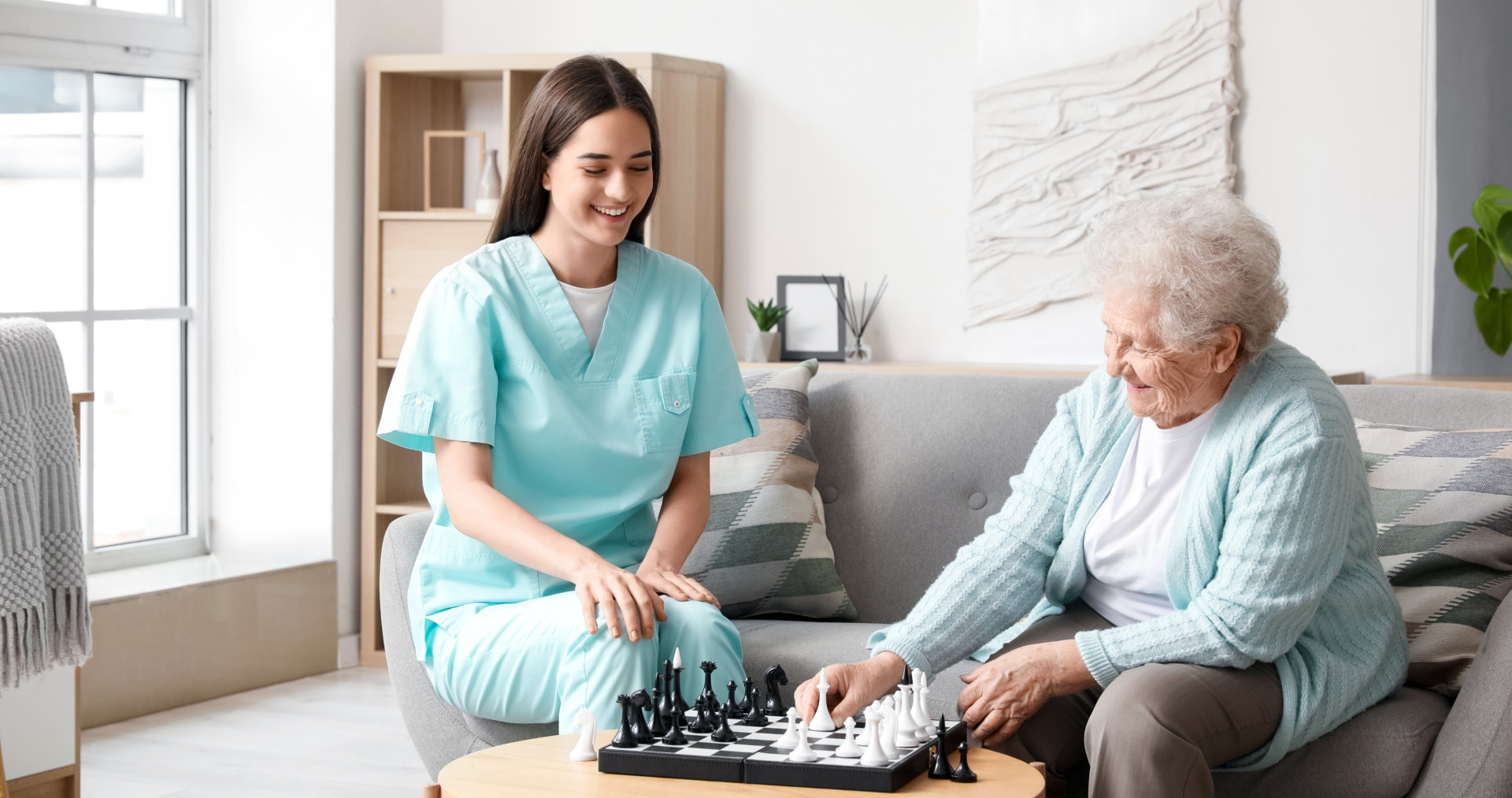 Nurse playing with elderly people