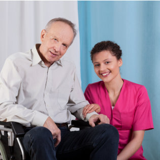 patient and caregiver looking at camera